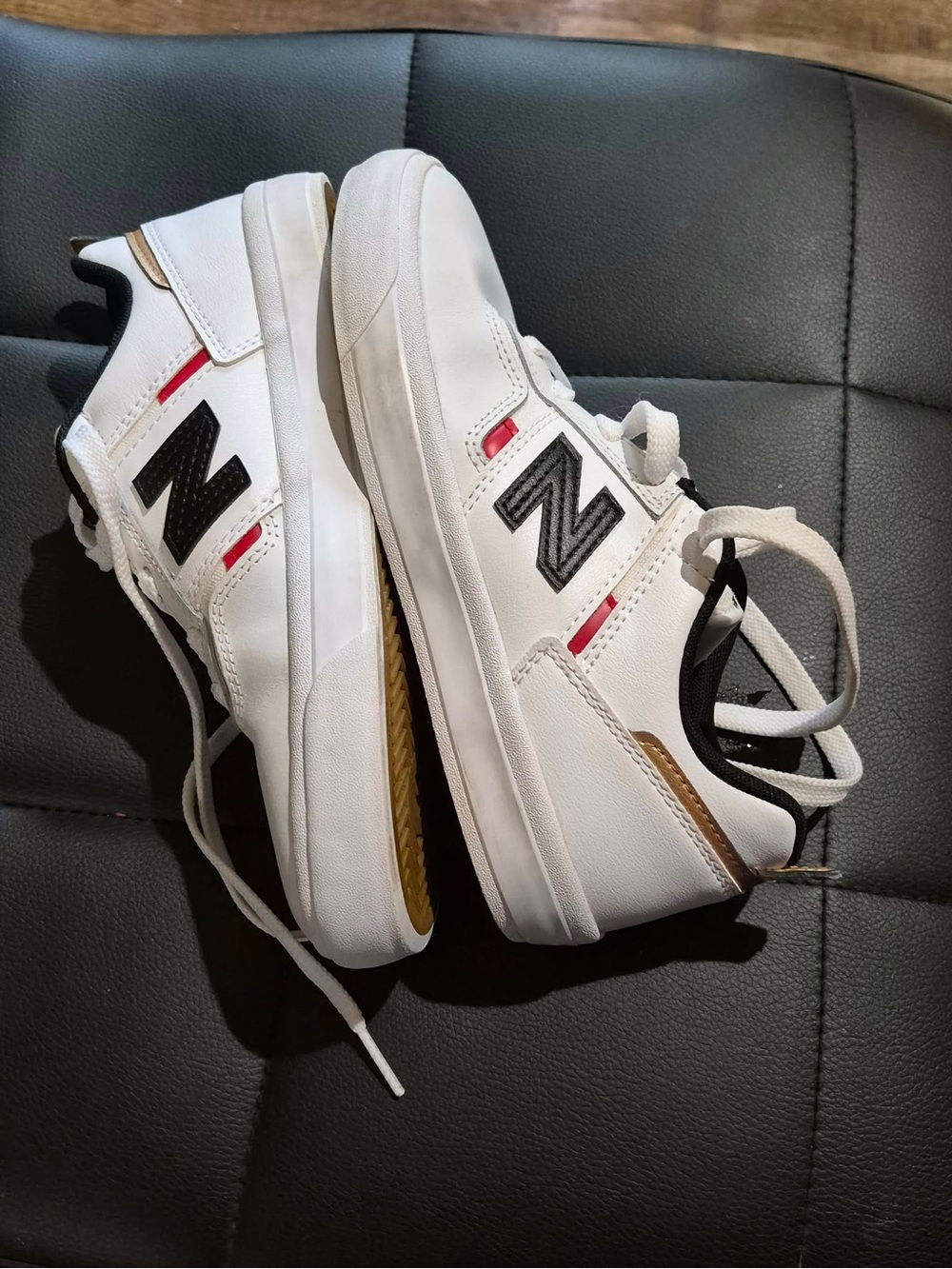 New Balance White Kids Sneakers with Black and Red Accents